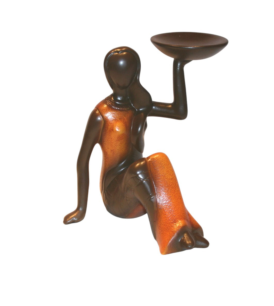 Orange-braune Kerzenständer-Figur in Form einer Frau aus Südamerika