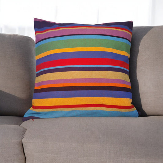 Buntes Kissen Fiesta auf einem Sofa im Wohnzimmer aus 100% Baumwolle, hergestellt in Lateinamerika